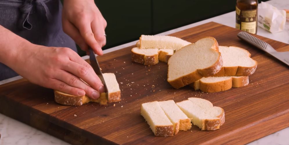 cutting bread into pieces