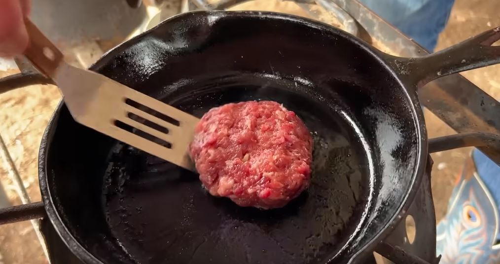 frying sausage patty